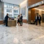 The First Impression Problem: Why Your Building’s Lobby Stone Tells Tenants Everything