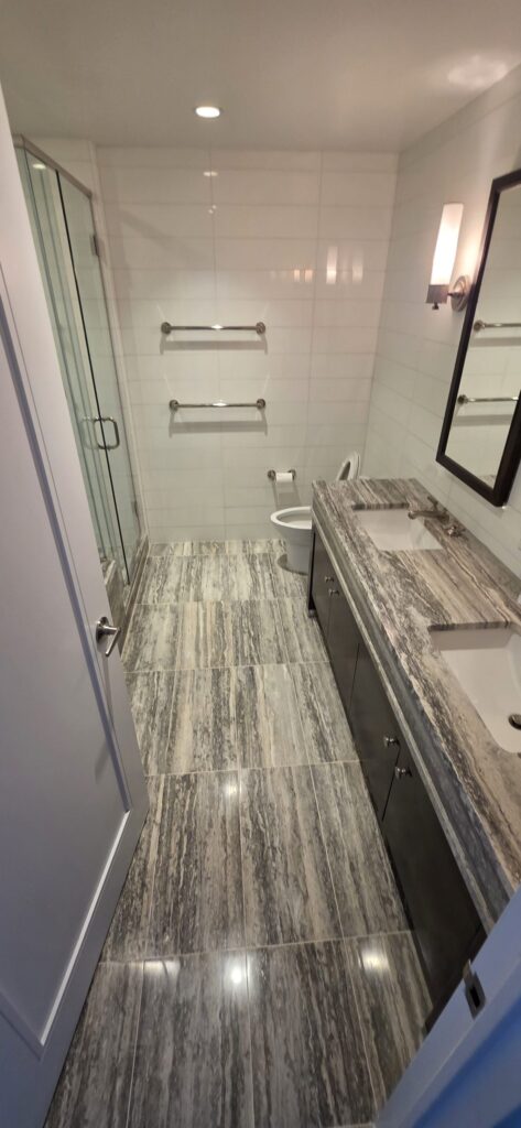 Stone Shower Curb Repair and Bathroom Floor Restoration
