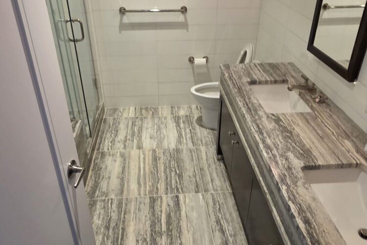 Stone Shower Curb Repair and Bathroom Floor Restoration